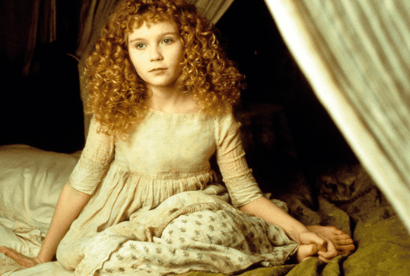 Kirsten Dust como Claudia no filme Entrevista com o Vampiro