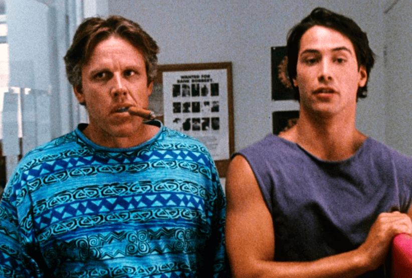 Gary Busey e Keanu Reeves em Caçadores de Emoção