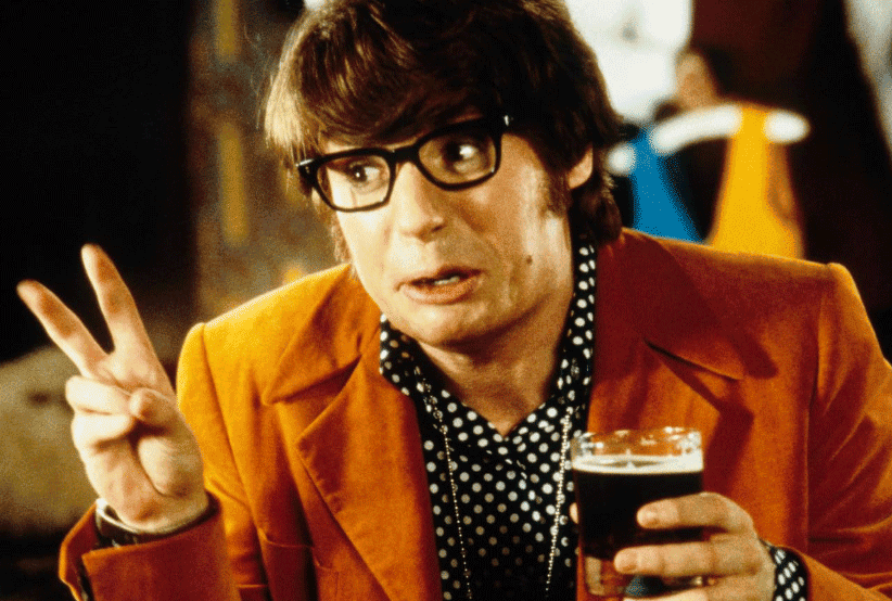 Mike Myers | Filme: Austin Powers - 000 Um Agente Nada Discreto (1997). Em uma lista que reúne os personagens mais importantes dos anos 90.