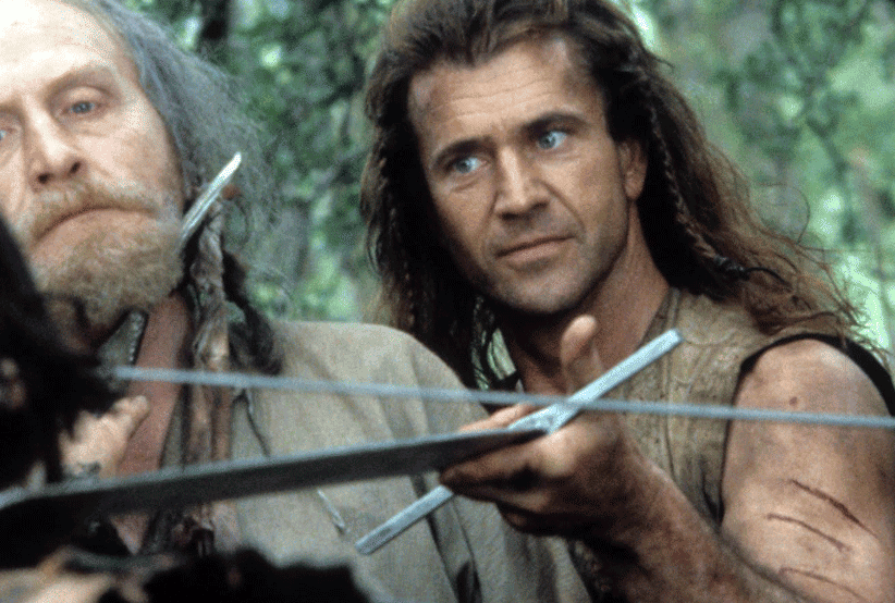 Mel Gibson | Filme: Coração Valente (1995). Em uma lista que reúne os personagens mais importantes dos anos 90.