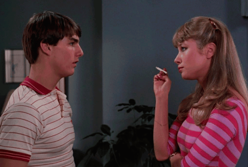 Tom, cruise jogando carta em uma imagem do filme Negócio Arriscado (1983). Em uma lista com os filmes de Tom Cruise.