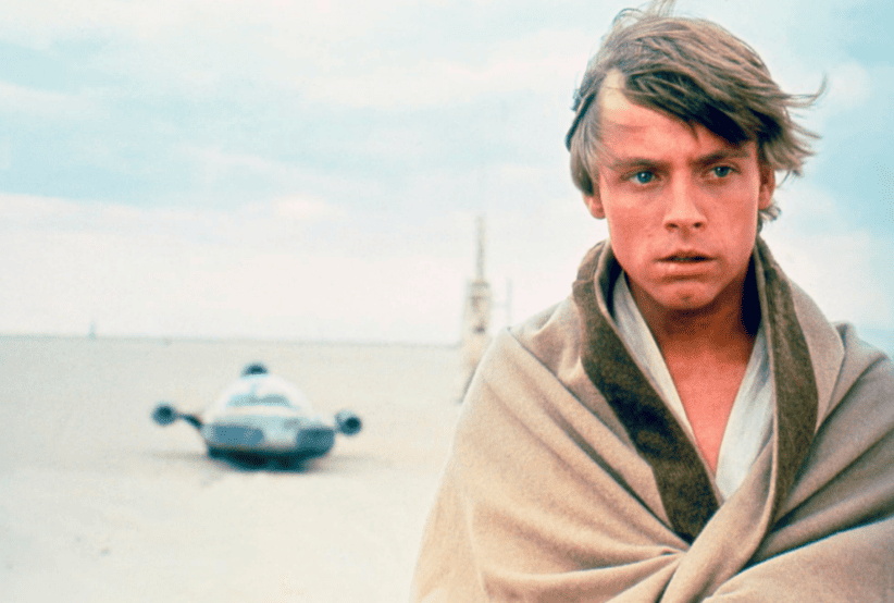 Mark Hamill como Luke Skywalker no filme Star Wars: Episódio IV - Uma Nova Esperança (1977), em uma lsita com os 30 personagens mais famosos dos anos 70.