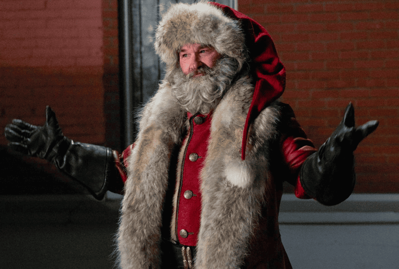 Papai Noel (Kurt Russell)no filme Crônicas de Natal (2018). Em uma lista dos melhores filmes de natal.