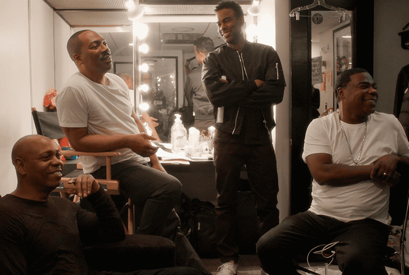 Eddie Murphy, Chris Rock, Dave Chappelle e Tracy Morgan no documentário Eu, Eddie. Em uma lista que reúne os melhores filmes de Eddie Murphy.