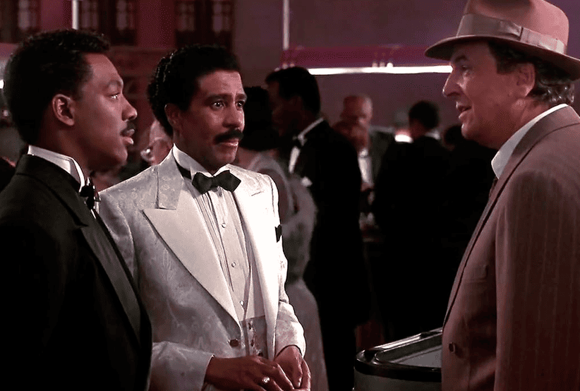 Eddie Murphy, Danny Aiello e Richard Pryor em os donos da noite (1989). Em uma lista que reúne os melhores filmes de Eddie Murphy.