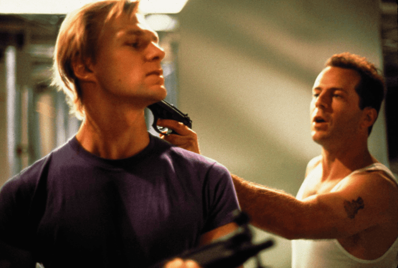 Bruce Willis e Andreas Wisniewski em Duro de Matar (1988). 15 curiosidades sobre Duro De Matar (1988).