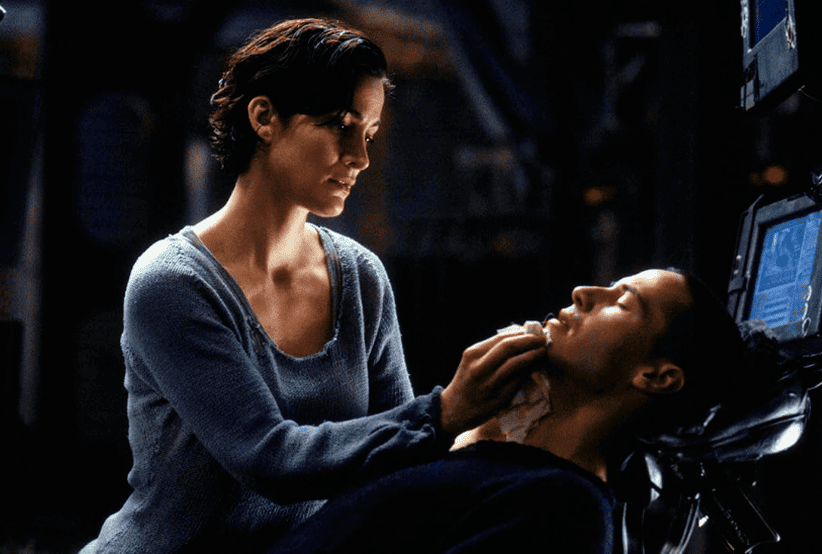 Casais do Cinema:  Keanu Reeves e Carrie-Anne Moss no Filme: Matrix (1999)