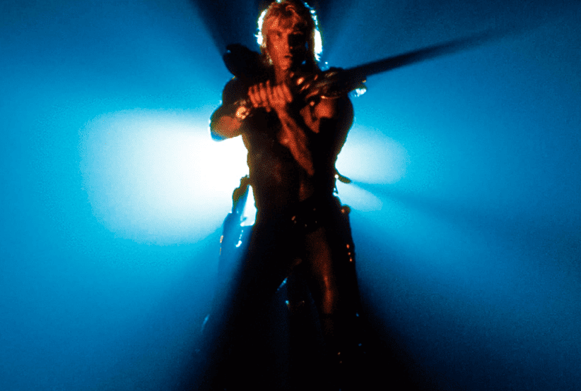 Dolph Lundgren como He-Man em Mestres do Universo em Mestres do Universo