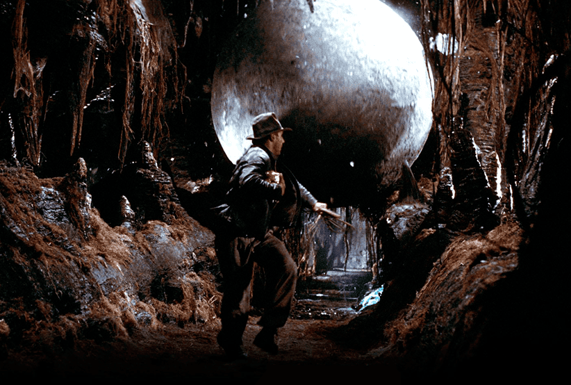 Cena de Indiana Jones e os Caçadores da Arca Perdida. Indiana Jones: Tudo Sobre a Maior Franquia de Aventura do Cinema